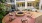 chairs and a fountain outside a building
