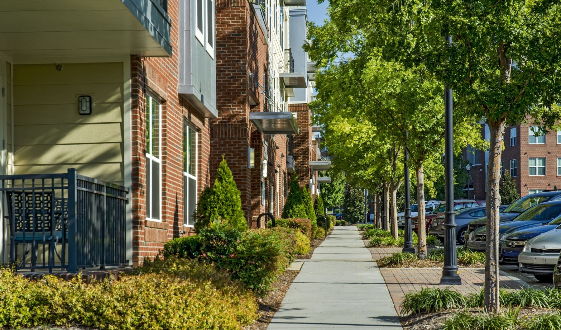 a spacious well-landscaped sidewalk