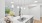 kitchen and dining room with modern appliances and bright lighting