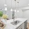 kitchen and dining room with modern appliances and bright lighting
