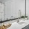 bathroom with a large mirror