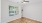 spacious room on wood-style flooring and with bright-natural lighting